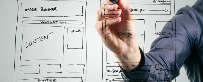 designer drawing website development wireframe